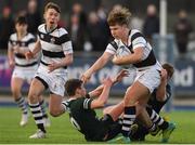 13 February 2019; Justin Leonard of Belvedere College is tackled by Jack Hannon, left, and Donough Lawlor of Newbridge College during the Bank of Ireland Leinster Schools Senior Cup Round 2 match between Belvedere College and Newbridge College at Energia Park in Donnybrook, Dublin.  Photo by Eóin Noonan/Sportsfile
