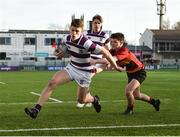 14 February 2019; Luke McDermott of Clongowes Wood scores his side's fifth try despite the tackle of Eoghan Healy of CBC Monkstown during the Bank of Ireland Leinster Schools Senior Cup Round 2 match between Clongowes Wood College and CBC Monkstown at Energia Park in Donnybrook, Dublin. Photo by Matt Browne/Sportsfile