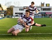 14 February 2019; Luke McDermott of Clongowes Wood scores his side's fifth try despite the tackle of Eoghan Healy of CBC Monkstown during the Bank of Ireland Leinster Schools Senior Cup Round 2 match between Clongowes Wood College and CBC Monkstown at Energia Park in Donnybrook, Dublin. Photo by Matt Browne/Sportsfile
