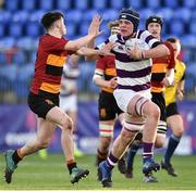 14 February 2019; Tom Coghlan of Clongowes Wood is tackled by Gareth Hughes of CBC Monkstown during the Bank of Ireland Leinster Schools Senior Cup Round 2 match between Clongowes Wood College and CBC Monkstown at Energia Park in Donnybrook, Dublin. Photo by Matt Browne/Sportsfile