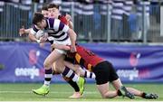 14 February 2019; Mark Galvin of Clongowes Wood is tackled by Gareth Hughes, left, and Robbie Browne of CBC Monkstown during the Bank of Ireland Leinster Schools Senior Cup Round 2 match between Clongowes Wood College and CBC Monkstown at Energia Park in Donnybrook, Dublin. Photo by Matt Browne/Sportsfile