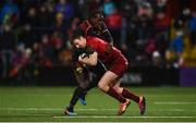15 February 2019; Darren Sweetnam of Munster is tackled by Yaw Penxe of Southern Kings during the Guinness PRO14 Round 15 match between Munster and Southern Kings at Irish Independent Park in Cork. Photo by Diarmuid Greene/Sportsfile