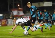 15 February 2019; Chris Shields of Dundalk is tackled by Kris Twardek of Sligo Rovers during the SSE Airtricity League Premier Division match between Dundalk and Sligo Rovers at Oriel Park in Dundalk, Louth. Photo by Ben McShane/Sportsfile