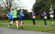 16 February 2019; Vhi staff, from left, Sinead Gray, Susan Byrne and Conor Cleary, encourage runners at St Anne’s parkrun where Vhi, presenting partner of parkrun Ireland, performed a staff takeover with 25 employees fulfilling volunteer roles and ensuring the smooth running of the event. Vhi ambassador and Olympian David Gillick was on hand to lead the warm-up for parkrun participants before completing the 5km free event. parkrun in partnership with Vhi support local communities in organising free, weekly, timed 5k runs every Saturday at 9.30am. To register for a parkrun near you visit www.parkrun.ie. Photo by Sam Barnes/Sportsfile