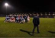 16 February 2019; Cork manager John Meyler walks ahead as his players stand for a pre-match photograph before the Allianz Hurling League Division 1A Round 3 match between Cork and Clare at Páirc Uí Rinn in Cork. Photo by Piaras Ó Mídheach/Sportsfile
