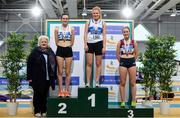 16 February 2019; Athletics Ireland President Georgina Drumm, left, Women's 3k Walk medallists, from left, Niamh O'Connor of Celbridge AC, Co. Kildare, silver, Kate Veale of West Waterford AC, Co. Waterford, gold, Sarah Glennon of Mullingar Harriers AC, Co. Westmeath, bronze, during day 1 of the Irish Life Health National Senior Indoor Athletics Championships at the National Indoor Arena in Abbotstown, Dublin. Photo by Sam Barnes/Sportsfile
