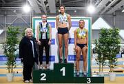 16 February 2019; Athletics Ireland President Georgina Drumm with Women's Long Jump medallists, from left, Lydia Mills of Ballymena & Antrim AC, Co. Antrim, silver, Ruby Millet of St. Abbans AC, Laois, gold, and Amy McTeggart of Boyne AC, Co. Louth, bronze, during day 1 of the Irish Life Health National Senior Indoor Athletics Championships at the National Indoor Arena in Abbotstown, Dublin. Photo by Sam Barnes/Sportsfile