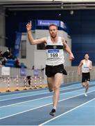 17 February 2019; John Travers of Donore Harriers, Co. Dublin, celebrates winning the Men's 3000m event during day two of the Irish Life Health National Senior Indoor Athletics Championships at the National Indoor Arena in Abbotstown, Dublin. Photo by Sam Barnes/Sportsfile
