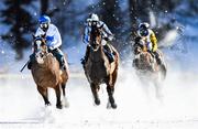 17 February 2019; Filou, with Raphael Lingg up, left, and Jungleboogie, with Eddy Hardouin up, during the Longines 80 Grosser Preis von St. Moritz flat race at the White Turf horse racing event at St Moritz, Switzerland. Photo by Ramsey Cardy/Sportsfile