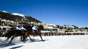 17 February 2019; Runners and riders break from the start gates during the GP Guardaval Immobilien-Zuoz und Blasto race at the White Turf horse racing event at St Moritz, Switzerland. Photo by Ramsey Cardy/Sportsfile