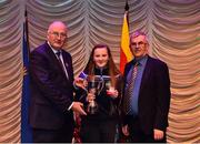 16 February 2019; Mary Kate Bonnes from Tír na nÓg, Randalstown, Antrim, representing Ulster is presented with the trophy by Uachtaráin Cumann Lúthchleas Gael John Horan alongside Aodán Ó Braonáin, Cathaoirleach, after winning the Aithriseoireacht catagory during the Cream of The Crop at Scór na nÓg All Ireland Finals at St Gerards De La Salle Secondary School in Castlebar, Co Mayo. Photo by Eóin Noonan/Sportsfile