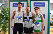 17 February 2019; Men's 3000m medallists, from left, Paul Robinson of St. Coca's AC, Co. Kildare, silver, John Travers of Donore Harriers, Co. Dublin, gold, and Brian Fay of Raheny Shamrock AC, Co. Dublin, bronze, during day two of the Irish Life Health National Senior Indoor Athletics Championships at the National Indoor Arena in Abbotstown, Dublin. Photo by Sam Barnes/Sportsfile