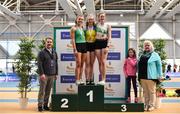 17 February 2019; Athletics Ireland President Georgina Drumm, right, former Athletics Ireland President Ciarán Ó Catháin, left, Hannah Coffey and the Women's Pole Vault medallists, from left, Ciara Hickey of Blarney/Inniscara AC, Co. Cork, silver, Clodagh Walsh of Abbey Striders AC, Co. Cork, gold, and Orla Coffey of Carraig-Na-Bhfear AC, Co. Cork, bronze during day two of the Irish Life Health National Senior Indoor Athletics Championships at the National Indoor Arena in Abbotstown, Dublin. Photo by Sam Barnes/Sportsfile