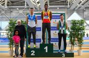17 February 2019; Men's 60m medallists, from left, Marcus Lawler of St. Laurence O'Toole AC, Co. Carlow, silver, Joseph Olalekan Ojemumi of Tallaght AC, Co. Dublin, gold, Dean Adams of Ballymena & Antrim AC, Co. Antrim, bronze, with Padriag Griffin, Competitions Committee, during day two of the Irish Life Health National Senior Indoor Athletics Championships at the National Indoor Arena in Abbotstown, Dublin. Photo by Sam Barnes/Sportsfile
