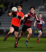 20 February 2019; Brian Begley of UCC in action against Jarlath Óg Burns of St Mary's during the Electric Ireland HE GAA Sigerson Cup Final match between St Mary's University College Belfast and University College Cork at O'Moore Park in Portlaoise, Laois. Photo by Piaras Ó Mídheach/Sportsfile