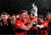 20 February 2019; Kevin Flahive of UCC celebrates with champagne after the Electric Ireland HE GAA Sigerson Cup Final match between St Mary's University College Belfast and University College Cork at O'Moore Park in Portlaoise, Laois. Photo by Piaras Ó Mídheach/Sportsfile