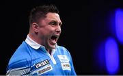 21 February 2019; Gerwyn Price celebrates scoring a '180' during his Premier League Darts Night Three match against James Wade at the 3Arena in Dublin. Photo by Seb Daly/Sportsfile