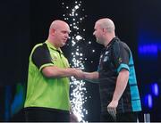21 February 2019; Michael van Gerwen, left, and Rob Cross shake hands following their Premier League Darts Night Three match at the 3Arena in Dublin. Photo by Seb Daly/Sportsfile