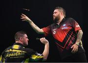 21 February 2019; (EDITORS NOTE: Image created using the multiple exposure function in camera) Daryl Gurney, left, and Michael Smith during their Premier League Darts Night Three match at the 3Arena in Dublin Photo by Seb Daly/Sportsfile