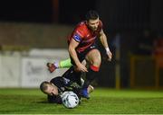 22 February 2019; Chris Lyons of Drogheda United is challenged by Paul Hunt of Cobh Ramblers during the SSE Airtricity League First Division match between Drogheda United and Cobh Ramblers in United Park in Drogheda, Co. Louth. Photo by Ben McShane/Sportsfile