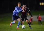 22 February 2019; Daniel Mandroiu of Bohemians in action against Paul Doyle of UCD during the SSE Airtricity League Premier Division match between UCD and Bohemians at the UCD Bowl in Dublin. Photo by Harry Murphy/Sportsfile