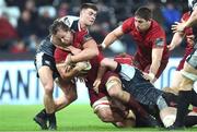 22 February 2019; Arno Botha of Munster is tackled by Matthew Aubrey and Sam Cross of Ospreys during the Guinness PRO14 Round 16 match between Ospreys and Munster at Liberty Stadium in Swansea, Wales. Photo by Ben Evans/Sportsfile