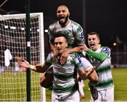 22 February 2019; Aaron McEneff of Shamrock Rovers, centre, celebrates with team-mates Ethan Boyle, top, and Sean Kavanagh, after scoring his side's second goal during the SSE Airtricity League Premier Division match between Shamrock Rovers and Derry City at Tallaght Stadium in Dublin. Photo by Seb Daly/Sportsfile