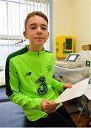 23 February 2019; Alex McKenna, age 12, from Duleek, Co. Meath, with his ECG during the Mrs. Brown's Boys FAI Heart Care Programme at United Park in Drogheda, Co Louth. Photo by Seb Daly/Sportsfile