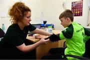 23 February 2019; Alex McKenna, age 12, from Duleek, Co. Meath, has his heart pressure taken by Dr. Ciara McKeogh during the Mrs. Brown's Boys FAI Heart Care Programme at United Park in Drogheda, Co Louth. Photo by Seb Daly/Sportsfile