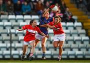 23 February 2019; Caoimhe Condon of Tipperary is tackled by Melissa Duggan, left, and Orlagh Farmer of Cork during the Lidl Ladies NFL Division 1 Round 3 match between Cork and Tipperary at Páirc Ui Rinn in Cork. Photo by Eóin Noonan/Sportsfile