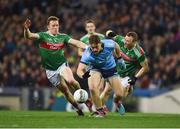 23 February 2019; Con O’Callaghan of Dublin in action against Donal Vaughan, left, and Colm Boyle of Mayo during the Allianz Football League Division 1 Round 4 match between Dublin and Mayo at Croke Park in Dublin. Photo by Daire Brennan/Sportsfile