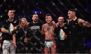 23 February 2019; James Gallagher celebrates with his SBG teammates, mother Doreen and father Andy, far left, following his Bantamweight bout with Steven Graham during Bellator 217 at the 3 Arena in Dublin. Photo by David Fitzgerald/Sportsfile