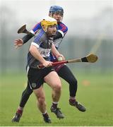 23 February 2019; Sean Dougan of St Mary's University College Belfast in action against Oisin Dunbar of Marino Institute of Education during the Electric Ireland HE GAA Fergal Maher Cup Final match between Marino Institute of Education and St Mary's University College Belfast at Waterford IT in Waterford. Photo by Matt Browne/Sportsfile