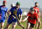 23 February 2019; Darren Browne of Mary Immaculate College in action against Shane Conway of University College Cork during the Electric Ireland HE GAA Fitzgibbon Cup Final match between Mary Immaculate College and University College Cork at Waterford IT in Waterford. Photo by Matt Browne/Sportsfile