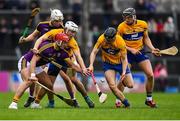 24 February 2019; Lee Chin of Wexford in action against Patrick O'Connor, left, and Jack Browne of Clare during the Allianz Hurling League Division 1A Round 4 match between Clare and Wexford at Cusack Park in Ennis, Clare. Photo by Eóin Noonan/Sportsfile