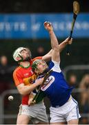 24 February 2019; Willie Dunphy of Laois in action against Paul Doyle of Carlow during the Allianz Hurling League Division 1B Round 4 match between Carlow and Laois at Netwatch Cullen Park in Carlow. Photo by Harry Murphy/Sportsfile