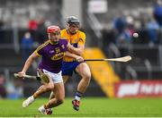 24 February 2019; Lee Chin of Wexford in action against Shane Golden of Clare during the Allianz Hurling League Division 1A Round 4 match between Clare and Wexford at Cusack Park in Ennis, Clare. Photo by Eóin Noonan/Sportsfile