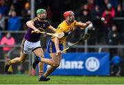 24 February 2019; Peter Duggan of Clare is fouled by Matthew O'Hanlon of Wexford resulting in a penalty during the Allianz Hurling League Division 1A Round 4 match between Clare and Wexford at Cusack Park in Ennis, Clare. Photo by Eóin Noonan/Sportsfile