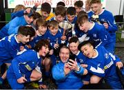 24 February 2019; The  Cavan/ Monaghan manager Francis Matthews team take a selfie with the Liam Miller cup and his team following the SFAI SUBWAY Liam Miller Cup Championship Final match between Mayo and Cavan/ Monaghan at Mullingar Athletic FC in Gainestown, Mullingar, Co. Westmeath. Photo by Sam Barnes/Sportsfile