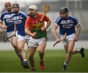 24 February 2019; Chris Nolan of Carlow in action against Donnacha Hartnett of Laois during the Allianz Hurling League Division 1B Round 4 match between Carlow and Laois at Netwatch Cullen Park in Carlow. Photo by Harry Murphy/Sportsfile