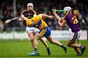 24 February 2019; Jason McCarthy of Clare is tackled by Liam Ryan of Wexford during the Allianz Hurling League Division 1A Round 4 match between Clare and Wexford at Cusack Park in Ennis, Clare. Photo by Eóin Noonan/Sportsfile