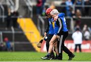 24 February 2019; John Conlon of Clare is helped off the pitch after going over on his ankle during the Allianz Hurling League Division 1A Round 4 match between Clare and Wexford at Cusack Park in Ennis, Clare. Photo by Eóin Noonan/Sportsfile