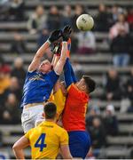 24 February 2019; Martin Reilly of Cavan out-jumps Darren O’Malley of Roscommon to score his side's third goal of the game during the Allianz Football League Division 1 Round 4 match between Cavan and Roscommon at the Kingspan Breffni Park in Cavan. Photo by Seb Daly/Sportsfile