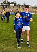 24 February 2019; Dara McVeety of Cavan with a young supporter following his side's victory during the Allianz Football League Division 1 Round 4 match between Cavan and Roscommon at the Kingspan Breffni Park in Cavan. Photo by Seb Daly/Sportsfile