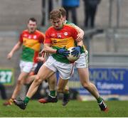 24 February 2019; Darragh O'Brien of Carlow in action against Johnny Moloney of Offaly during the Allianz Football League Division 3 Round 4 match between Offaly and Carlow at Bord Na Mona O'Connor Park in Tullamore, Offaly. Photo by Matt Browne/Sportsfile