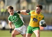 24 February 2019; Niall O’Donnell of Donegal in action against Jonny Cassidy of Fermanagh during the Allianz Football League Division 2 Round 4 match between Donegal and Fermanagh at O'Donnell Park in Letterkenny, Co Donegal. Photo by Oliver McVeigh/Sportsfile