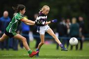 19 August 2018; Caoimhe Flannery of Skibereen, Co. Cork, in action against Zara Byrne of Ashbourne, Co. Meath, as they compete in the Gaelic Football Girls U12 event during day two of the Aldi Community Games August Festival at the University of Limerick in Limerick. Photo by Harry Murphy/Sportsfile