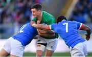 24 February 2019; Jonathan Sexton of Ireland is tackled by Luca Morisi, left, and Maxime Mbanda of Italy during the Guinness Six Nations Rugby Championship match between Italy and Ireland at the Stadio Olimpico in Rome, Italy. Photo by Ramsey Cardy/Sportsfile