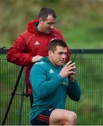 25 February 2019; CJ Stander uses a walkie-talkie as he is assisted with his GPS device by strength and conditioning coach Adam Sheehan Munster Rugby squad training at the University of Limerick in Limerick. Photo by Diarmuid Greene/Sportsfile