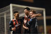 25 February 2019; Dinny Corcoran celebrates after scoring his side's first goal with his Bohemians team-mates Daniel Mandroiu, left, and Conor Levingston, right, during the SSE Airtricity League Premier Division match between Bohemians and Shamrock Rovers at Dalymount Park in Dublin. Photo by Stephen McCarthy/Sportsfile